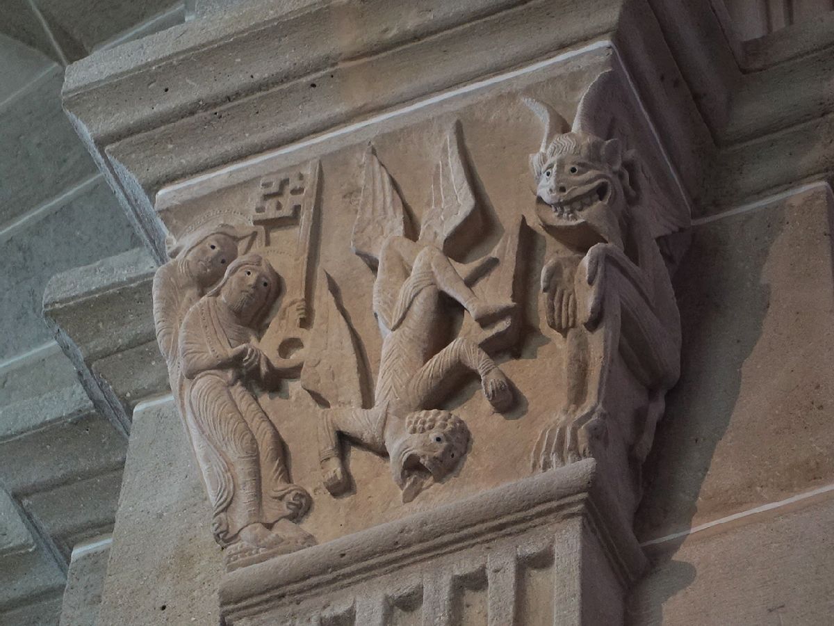 Stone relief titled Simon Magus, Autun Cathedral, 1146.